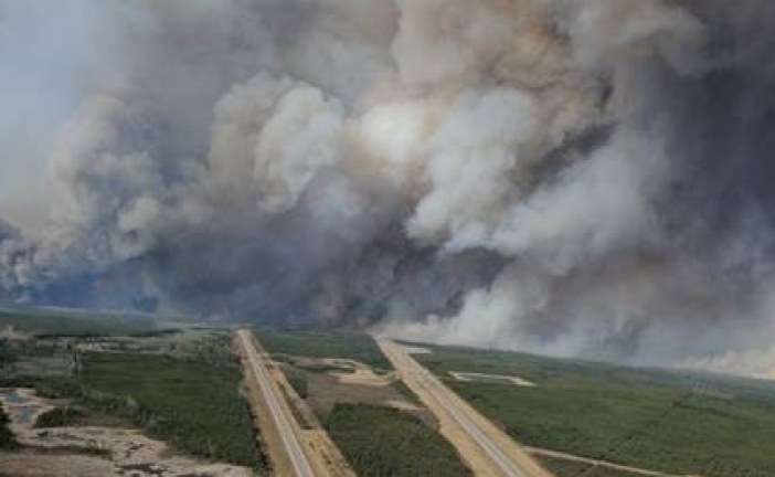 Some oil sands crude production restarts as wildfire sapped by cool weather