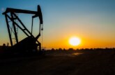 Oil rises as IEA hikes 2022 demand growth forecast
