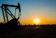Oil rises as IEA hikes 2022 demand growth forecast