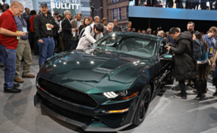 Detroit show has SUVs, horsepower, but electric cars are few