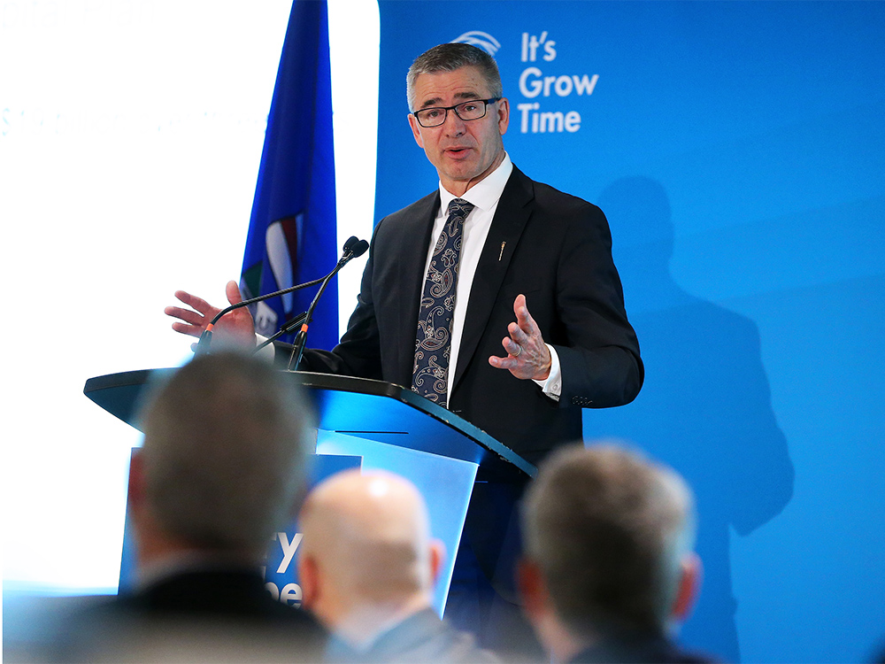  Alberta Finance Minister Travis Toews speaks to the Calgary Chamber of Commerce on Monday.