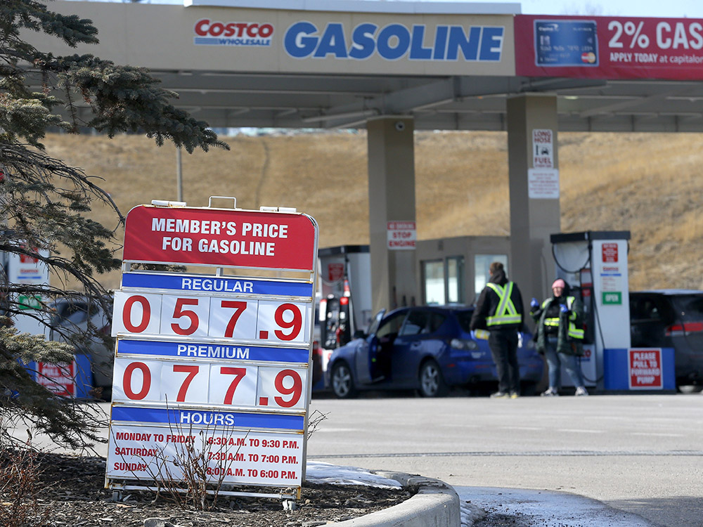  Gas prices are plunging, along with crude oil. This photo was taken on Thursday at a Calgary Costco.