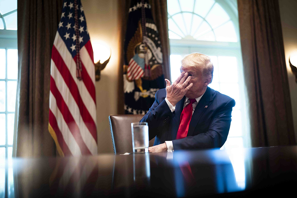  U.S. President Donald Trump listens during a roundtable meeting with energy sector CEOs in the White House on April 3.