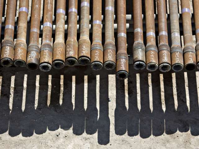 Drill pipe sits on a rack in the Permian Basin.