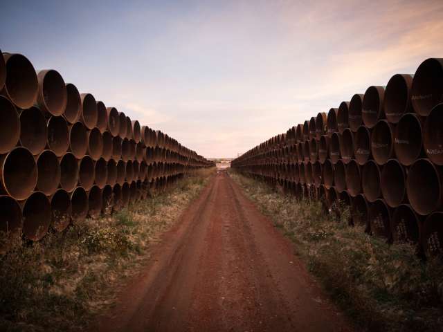 Miles of unused pipe for the Keystone XL expansion in North Dakota.