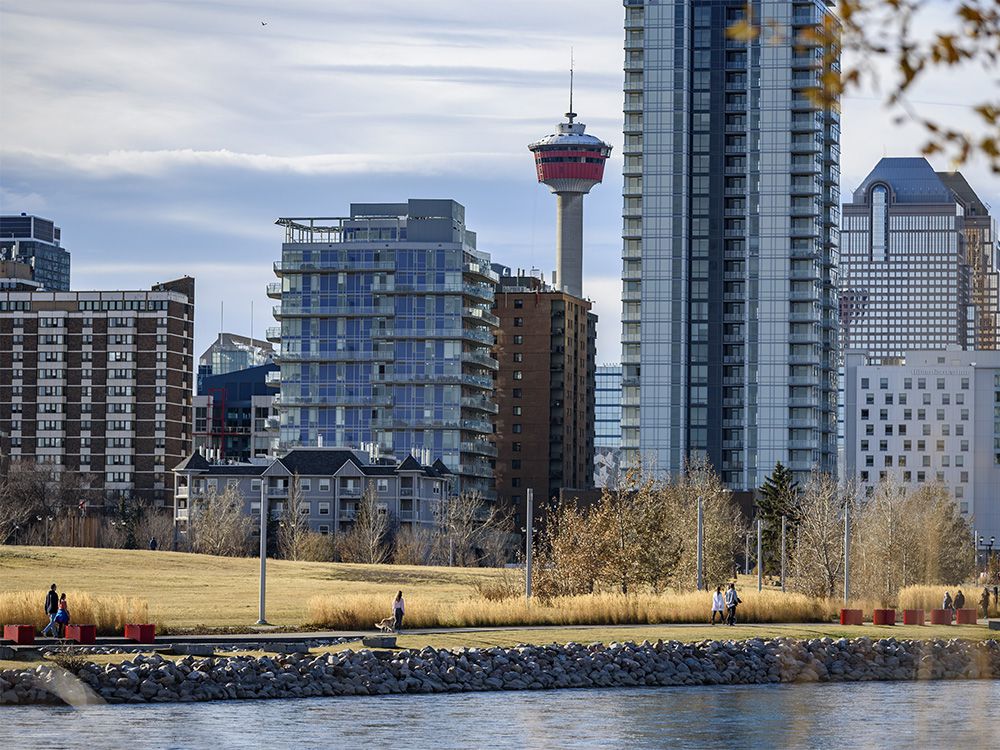  Calgarians enjoy spending the sunny warm Sunday along the Bow River on November 1, 2020.