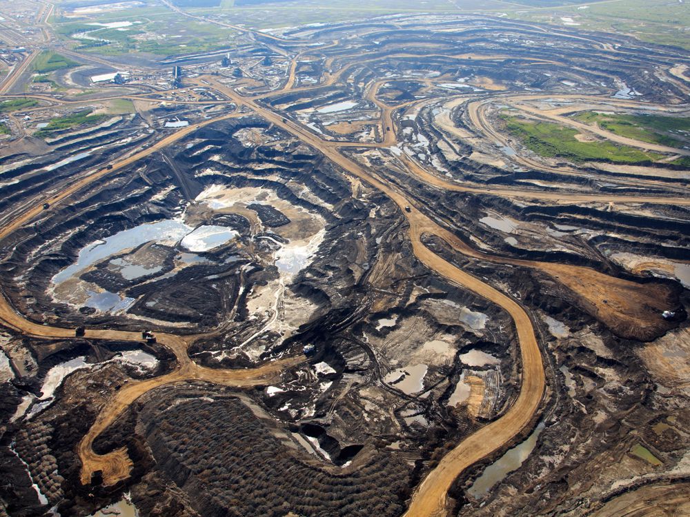  An aerial view of Canadian Natural Resources Ltd.’s oilsands mining operation near Fort McKay, Alta.