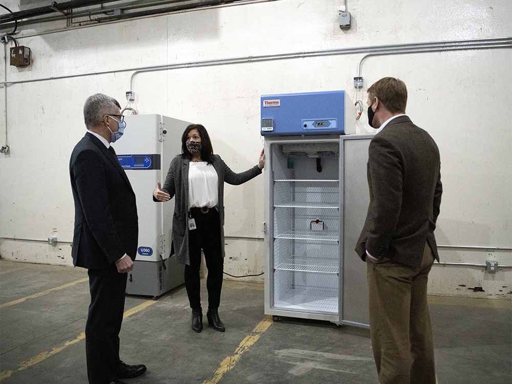  Kari Bergstrom, manager, Immunization, Business with Alberta Health, provides logistical highlights of the Provincial Vaccine Depot to Alberta’s Minister of Health Tyler Shandro, right, and Deputy Minister of Health Paul Wynnyk, left, on Monday, Dec. 14, 2020.