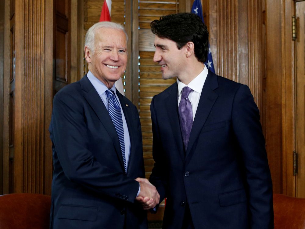  Prime Minister Justin Trudeau shakes hands with then-U.S. Vice President Joe Biden during a meeting in Trudeau’s office in Ottawa in 2016.