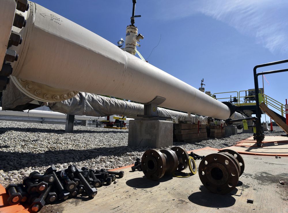  In this June 8, 2017, file photo, fresh nuts, bolts and fittings are ready to be added to the east leg of the pipeline near St. Ignace, Mich., as Enbridge prepares to test the east and west sides of the Line 5 pipeline under the Straits of Mackinac in Mackinaw City, Mich.