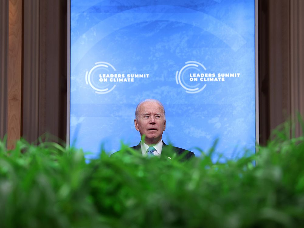  U.S. President Joe Biden looks on following his remarks in a virtual Climate Summit with world leaders in the East Room at the White House in Washington on April 23, 2021.