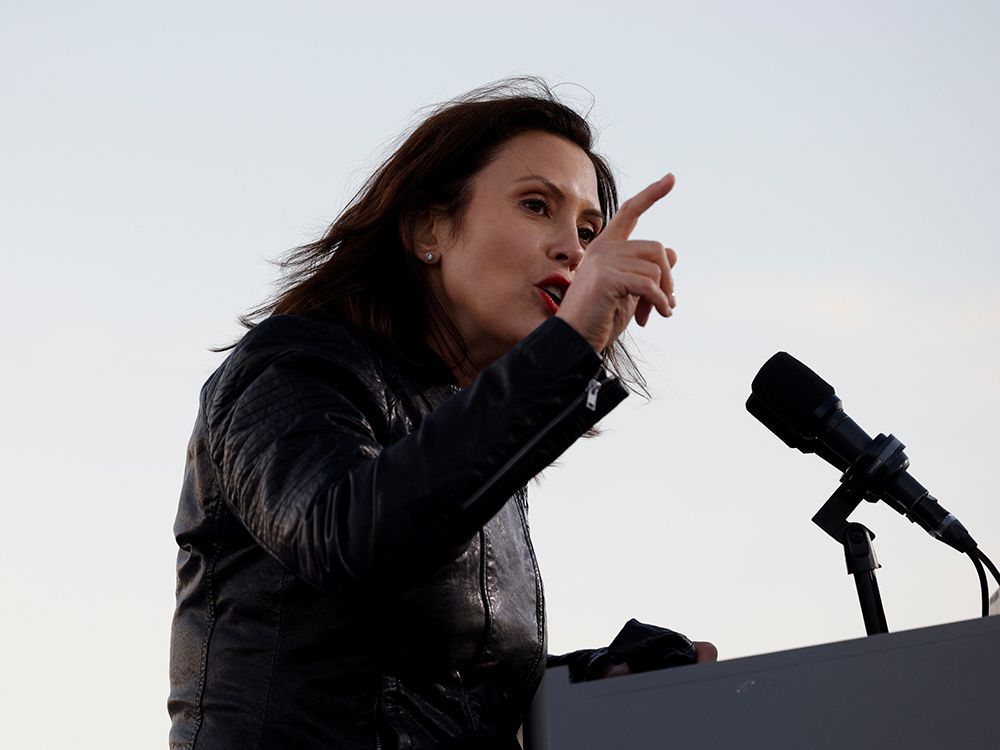  FILE PHOTO: Michigan Governor Gretchen Whitmer speaks ahead of Democratic U.S. presidential nominee and former Vice President Joe Biden, at a campaign drive-in, mobilization event in Detroit, Michigan, U.S., October 31, 2020.