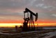 Oil edges lower as market weighs mixed supply signals