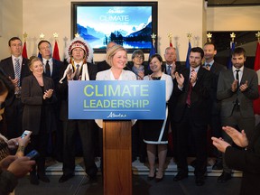 Environment Minister Steven Guilbeault, at far right, then an environmental consultant, is shown with then-Premier Rachel Notley as she unveiled Alberta’s climate strategy in November 2015.