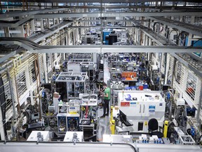 Employees are seen working at Ballard Power Systems in Burnaby, B.C.