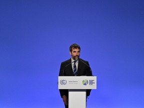 Steven Guilbeault, Minister of Environment and Climate Change speaks during a press conference at the COP26 Climate Change Conference in Glasgow on Nov. 12, 2021.