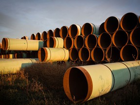 Miles of unused pipe, prepared for the proposed Keystone XL pipeline, sit in a lot outside Gascoyne, North Dakota in 2014.