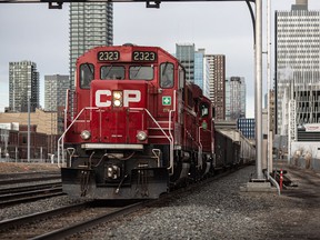 FILE – A Canadian Pacific Railway locomotive pulls a train in Calgary.