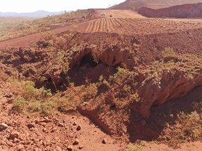 This handout file photo taken on May 15, 2020 and released by the PKKP Aboriginal Corporation and received by AFP on May 27, 2020 shows Juukan Gorge in Western Australia.