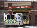 An ambulance waits outside the University of Alberta Hospital emergency area on Monday, Jan. 24, 2022.