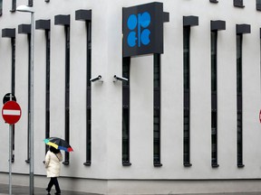 A woman walks past the OPEC headquarters in Vienna.