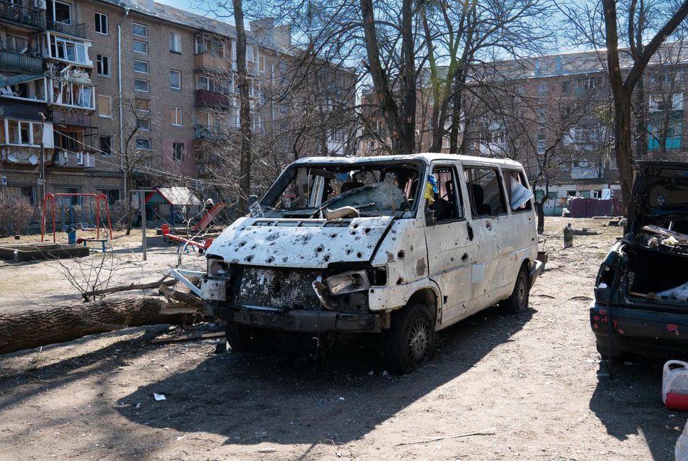 Damage from a Russian bomb, which landed in the centre of a residential apartment block in Kyiv, Ukraine. The blast wave from this strike destroyed an elementary school less than 200 feet away, dozens of apartments, and a grocery store. 1 person was reported killed and over 20 injured. March, 18, 2022. Kyiv, Ukraine. Michael Agosti for Toronto Star