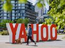 The familiar YAHOO sign has been installed on the pathway in East Village in advance of the Calgary Stampede.