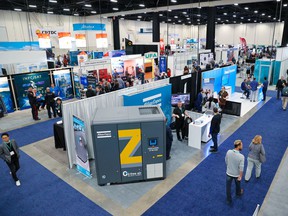 Attendees explore the exhibition show floor at the Global Energy Show in Calgary on Tuesday, June 7, 2022.