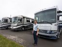 Bucars RV Centre general manager Jeff Redmond with new recreational vehicles on his lot in Balzac, Alta. on Tuesday, May 17, 2022. With gasoline prices hitting all-time highs, Redmond says he's planning to stay closer to home when RV camping this summer. But he adds recreational vehicles are still one of the most affordable ways to travel as a couple or with a family once other costs are factored in.