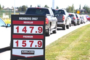 Drivers line up at Costco on Buffalo Run Blvd. on the outskirts of Calgary on Thursday.