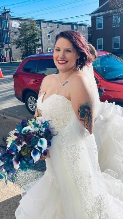 Samantha Murphy was supposed to get married on Saturday in Sydney, N.S. but then Storm Fiona showed up. She and her bridesmaids curled their hair with the one working power outlet at the hotel.