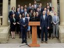 Alberta Premier Danielle Smith speaks to the media outside Government House following the swearing-in of her new cabinet ministers, in Edmonton Monday Oct. 24, 2022.