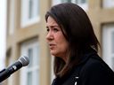 Alberta Premier Danielle Smith speaks to the media outside Government House following the swearing-in of her new cabinet ministers, in Edmonton Monday Oct. 24, 2022.