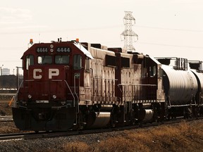 This file photo shows a Canadian Pacific locomotive hooked up to oil cars while idling on the tracks in Edmonton, on Tuesday, April 21, 2020.