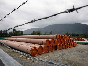Pieces of the Trans Mountain Pipeline project sit in a storage lot outside of Hope, British Columbia.