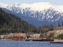 Cranes work in the water at the Kitimat LNG site in northwestern British Columbia.