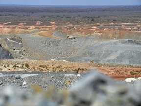 A dump truck drives through a lithium mine site in Australia.