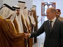 German Chancellor Olaf Scholz is welcomed upon arrival at the Amiri Diwan in the capital Doha on September 25, 2022. Germany has signed long-term natural gas deals with several countries, including Qatar, but not with Canada, notes Ron Wallace.
