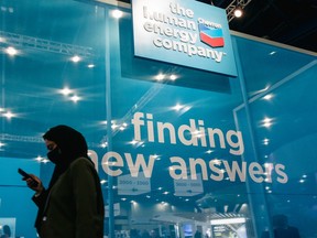 A person walks past the Chevron section at an exhibition during the 23rd World Petroleum Congress conference at the George R. Brown Convention Center on December 07, 2021 in Houston, Texas.