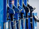 Taps are photographed at a gas station in Frankfurt, Germany, on Oct. 5, 2022. Crude oil prices took a beating Wednesday as market chaos related to a spreading banking crisis continued.