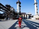 A Shell employee walks through the company's Quest Carbon Capture and Storage facility in Fort Saskatchewan, Alberta. The federal budget promises tens of billions to speed the transition to a net-zero emissions economy.