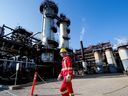 A Shell employee walks past the company's new Quest Carbon Capture and Storage facility in Fort Saskatchewan, Alta.