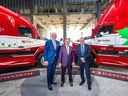 From left; Andrew J. Littlefair, president and CEO of Clean Energy, Murray Mullen, president and CEO of the Mullen Group and Michael Rose, president, CEO and chairman of Tourmaline Oil pose for a photo with two of the Mullen Group’s natural gas powered trucks following the announcement of a $70-million joint development agreement between Tourmaline and Clean Energy to build CNG stations in Western Canada. The announcement was made in Calgary on Tuesday, April 18, 2023.