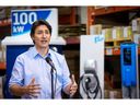 Prime Minister Justin Trudeau speaks during a news conference at a production facility of electric vehicle charger manufacturer Flo in Shawinigan, Quebec, Canada January 18, 2023.  