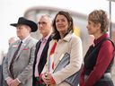 Premier Danielle Smith, second from right, and Mayor Jyoti Gondek, right, at the announcement of a new arena deal for Calgary.