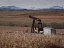 A decommissioned pumpjack is shown at a well head on an oil and gas installation near Cremona, Alta., on Saturday, Oct. 29, 2016. The Alberta government is moving ahead with a plan that would give oil and gas companies a tax break for meeting their legal obligations to clean up old well sites.
