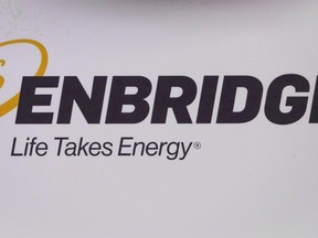 The Enbridge logo is shown at the company’s annual meeting in Calgary on May 9, 2018.