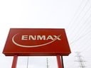 Power lines behind an Enmax sign in Calgary on Monday, April 25, 2022.