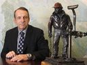 FILE PHOTO: Brian Schmidt, president and CEO of Tamarack Valley Energy is pictured along with his bronze sculpture Portrait of a Roughneck by Don Toney on Friday, January 2, 2015.