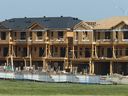 Home construction is shown in the far northeast community of Cornerstone in Calgary on Friday, July 21, 2023.